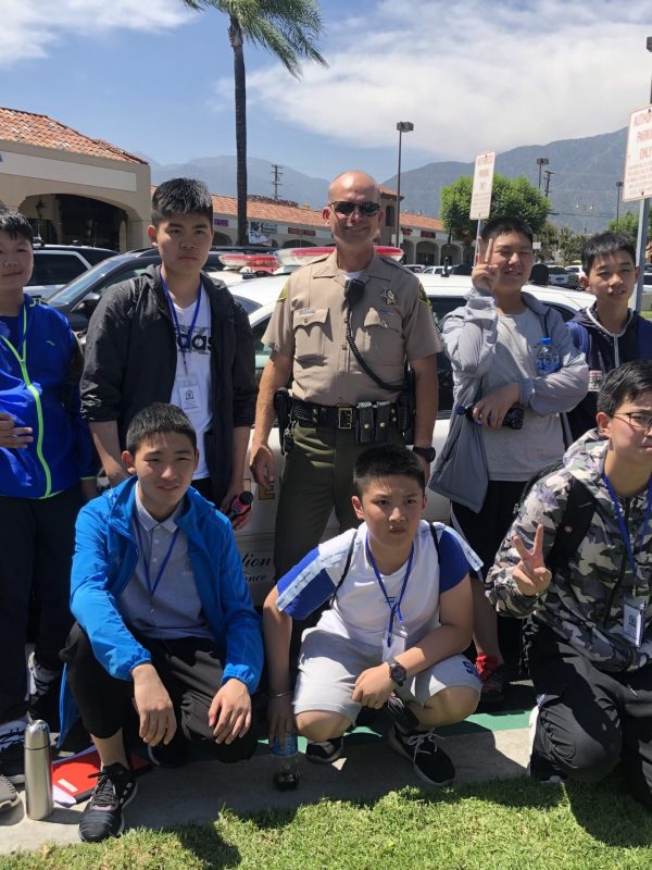 Students Posing With A Sheriff